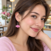 Imagem de Brinco Kawaii Docinho Rosa com Bolinhas Brancas